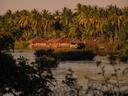 Thatch homes along the river.